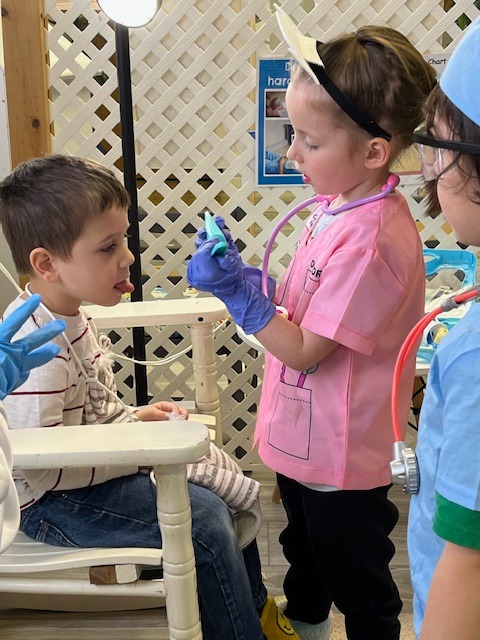 Children in dramatic play as doctors